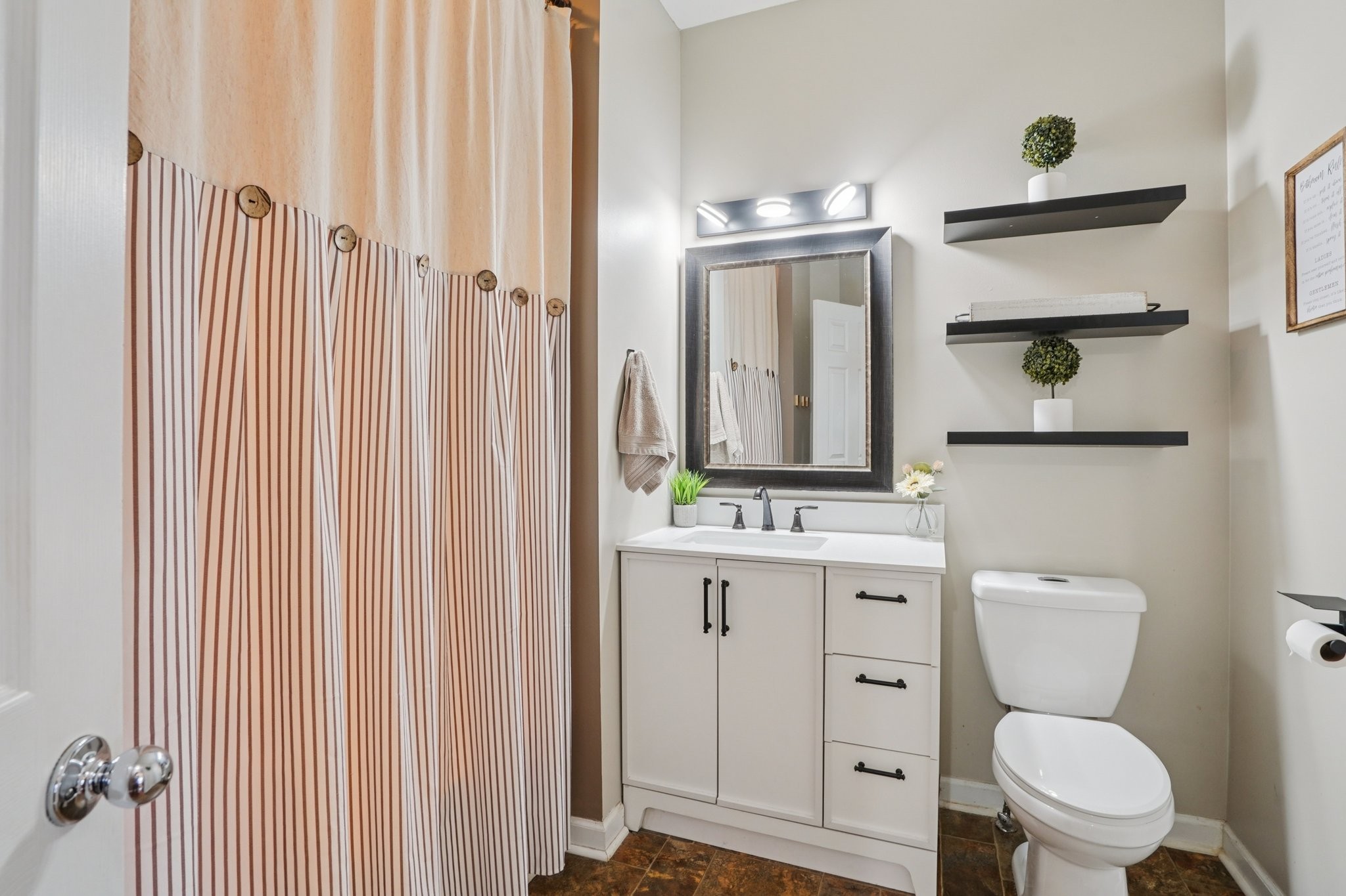 2994 Jarrell Ridge Farms Clarksville, TN 37043 - Photo 17 of 37 a bathroom with a toilet a sink and a mirror