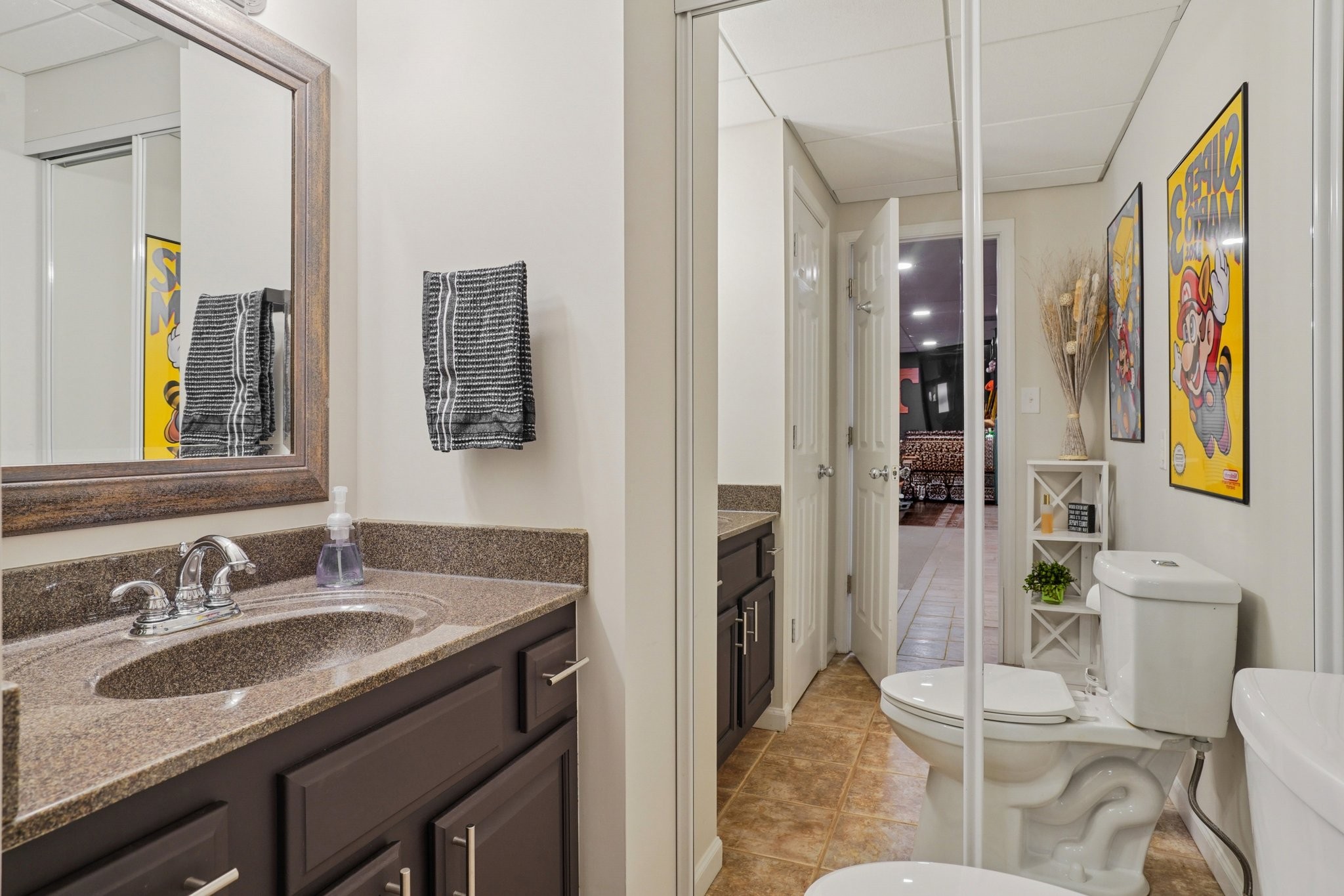 2994 Jarrell Ridge Farms Clarksville, TN 37043 - Photo 28 of 37 a en suite bathroom with a granite countertop sink and a mirror