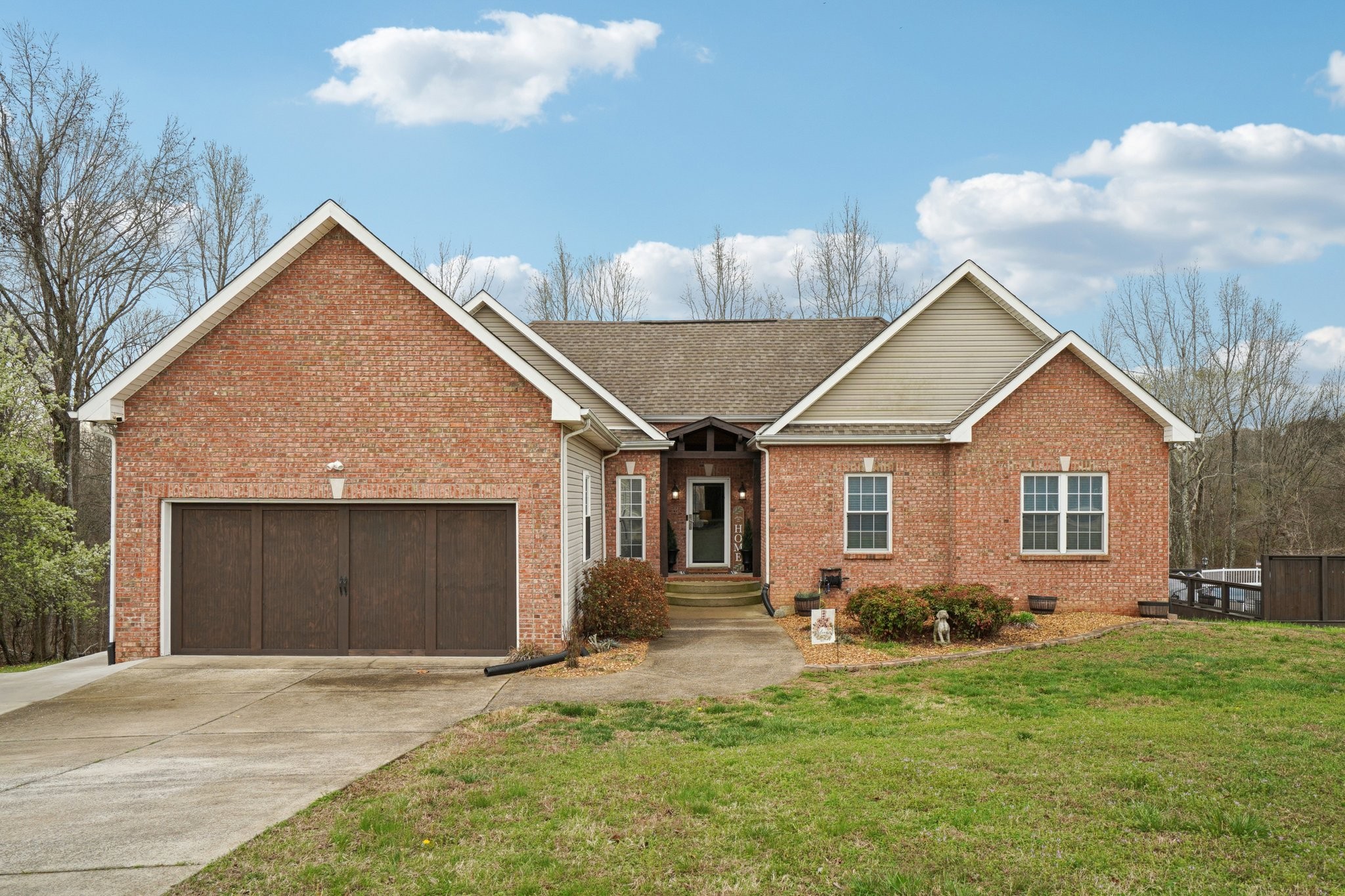 2994 Jarrell Ridge Farms Clarksville, TN 37043 - Photo 4 of 37 a front view of a house with garden