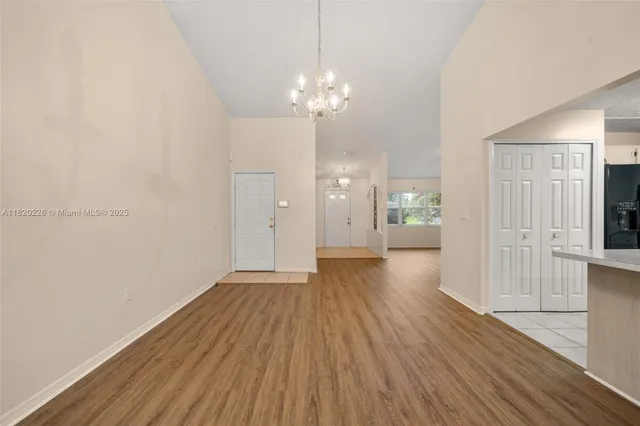 a view of a livingroom with wooden floor