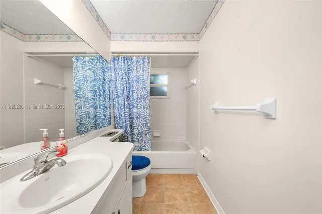 a view of a hallway with closet