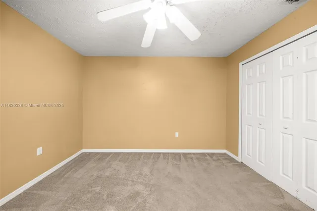 a view of empty room with a window