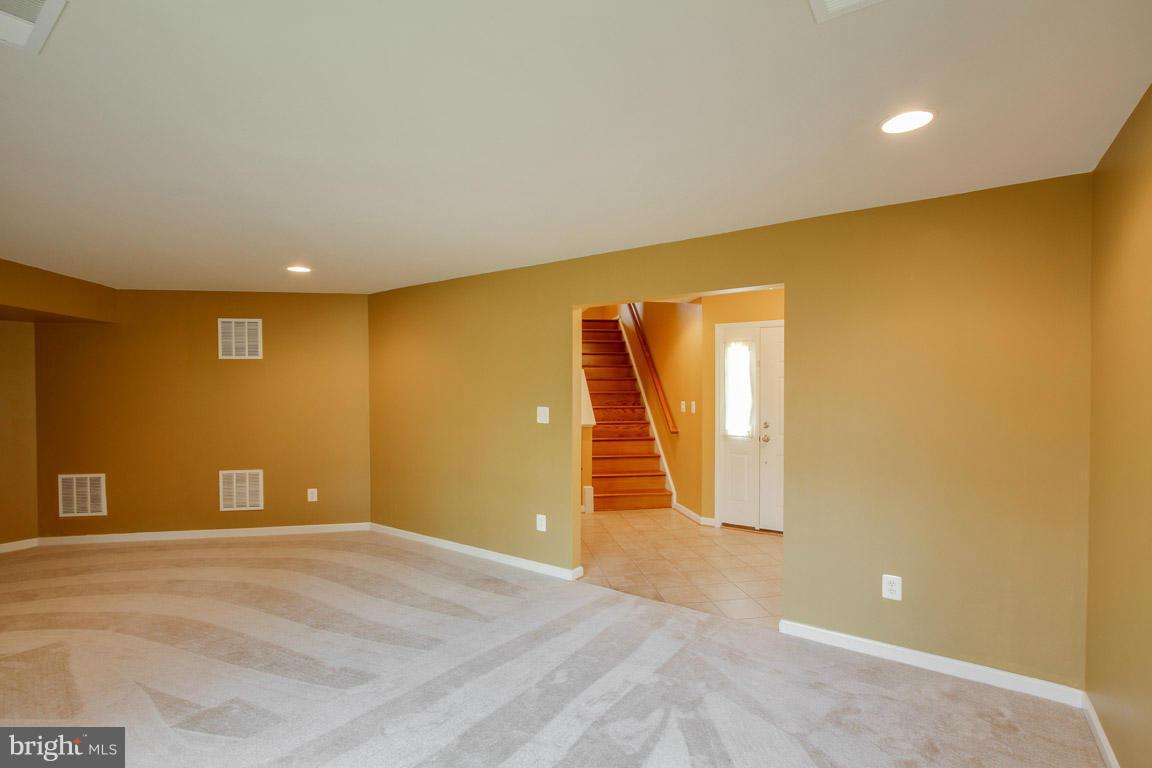 9087 Ribbon Falls Loop Bristow, VA 20136 - Photo 22 of 29 Recreation View to Foyer