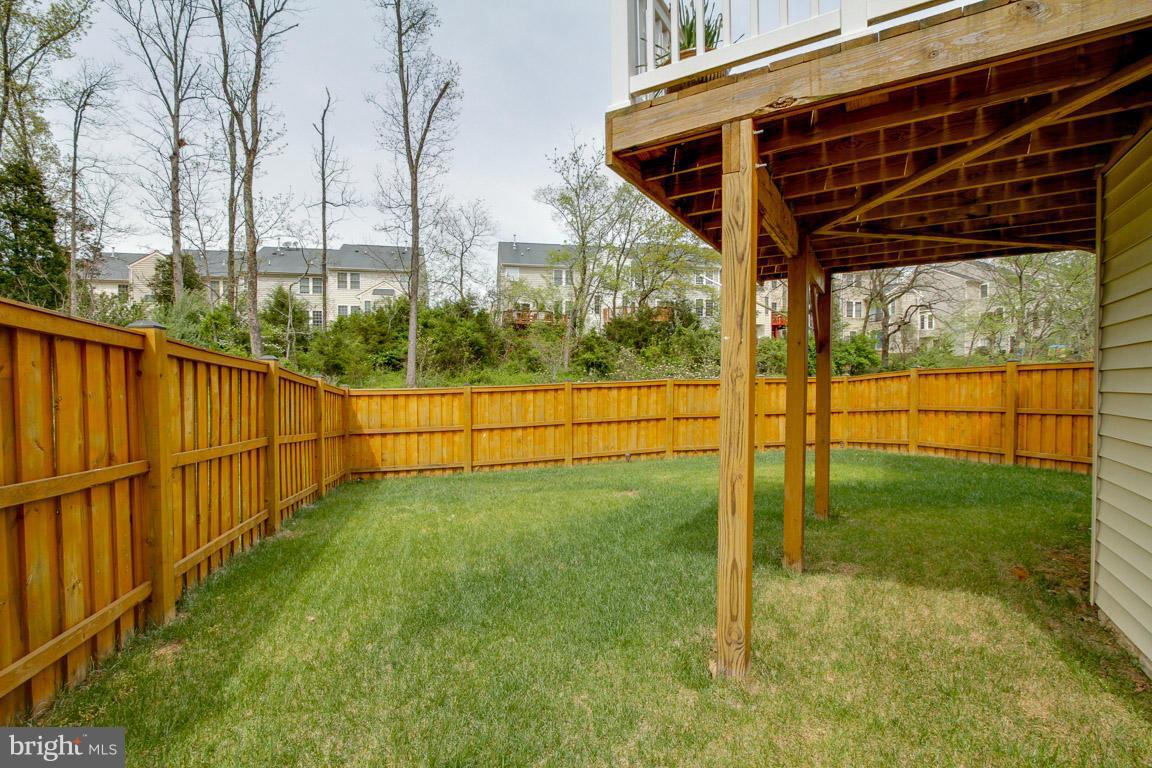 9087 Ribbon Falls Loop Bristow, VA 20136 - Photo 29 of 29 Backyard with Fence