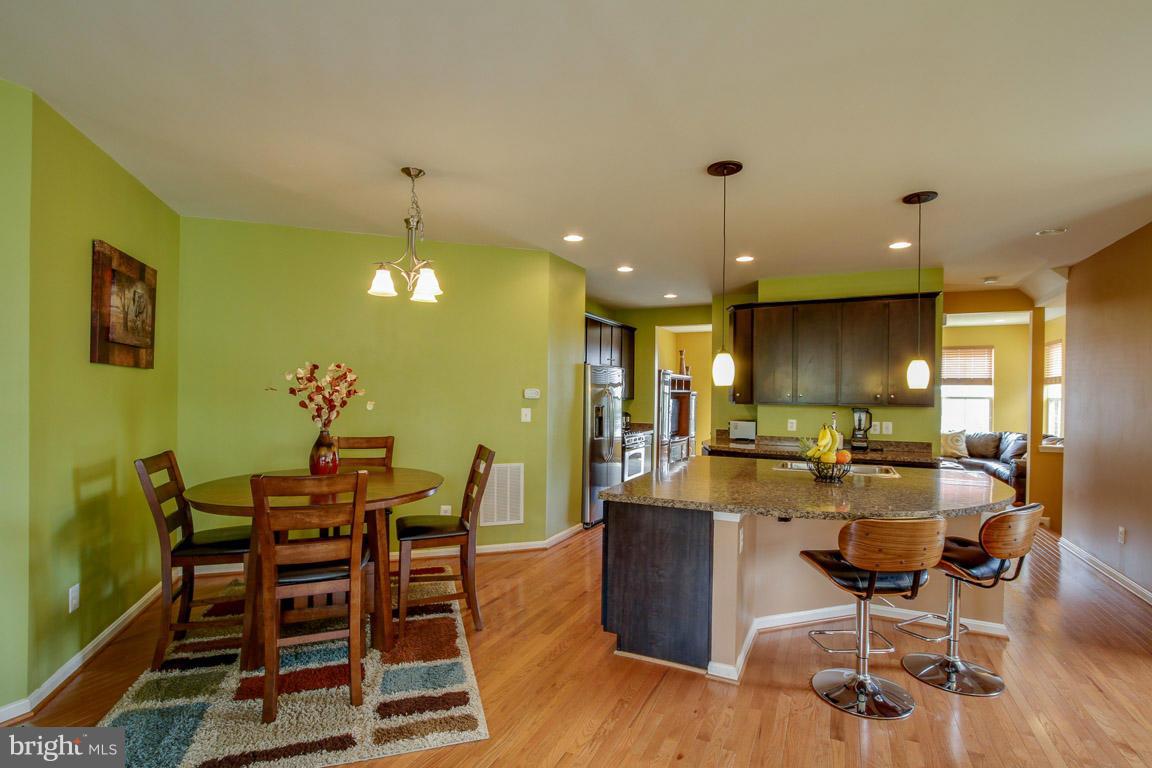 9087 Ribbon Falls Loop Bristow, VA 20136 - Photo 5 of 29 View of Dining and Kitchen