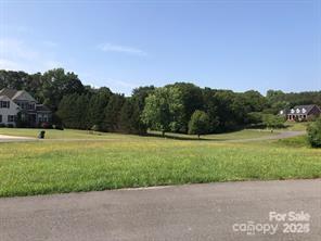 1013 Point Crossing Court, Unit 25 Shelby, NC 28152 - Photo 2 of 9 a view of a garden with a houses