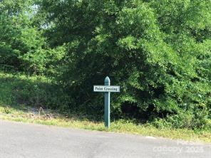 1013 Point Crossing Court, Unit 25 Shelby, NC 28152 - Photo 6 of 9 a table and chairs in a garden