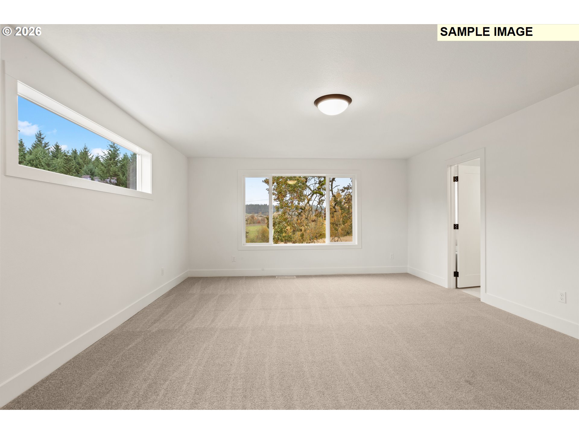 7283 Southwest Frog Pond Lane Wilsonville, OR 97070 - Photo 21 of 33 a view of an empty room with a window