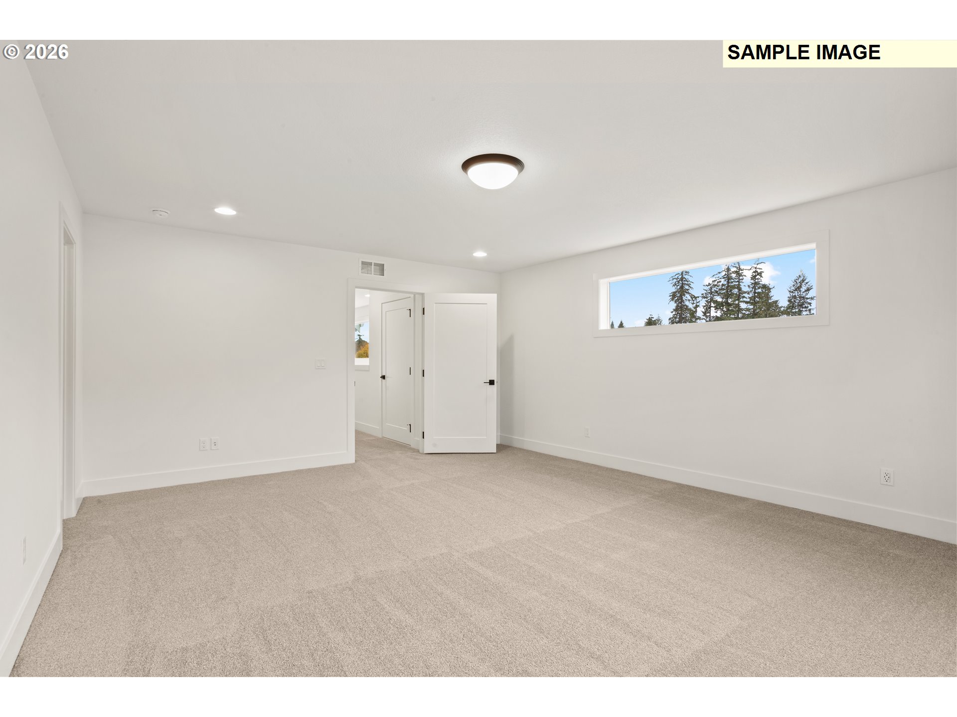 7283 Southwest Frog Pond Lane Wilsonville, OR 97070 - Photo 23 of 33 a view of an empty room with a window