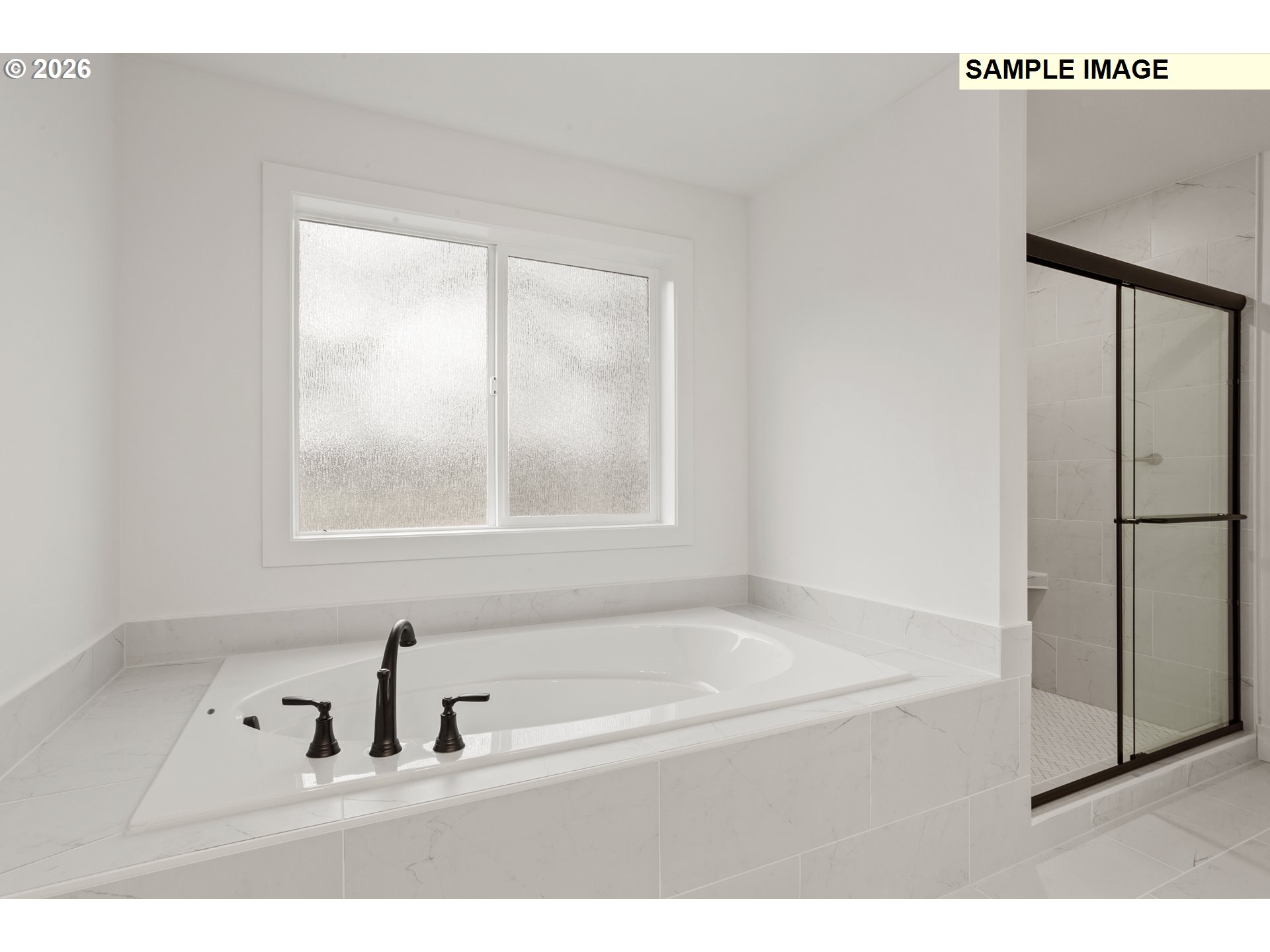 7283 Southwest Frog Pond Lane Wilsonville, OR 97070 - Photo 26 of 33 a bathroom with a bathtub and a sink