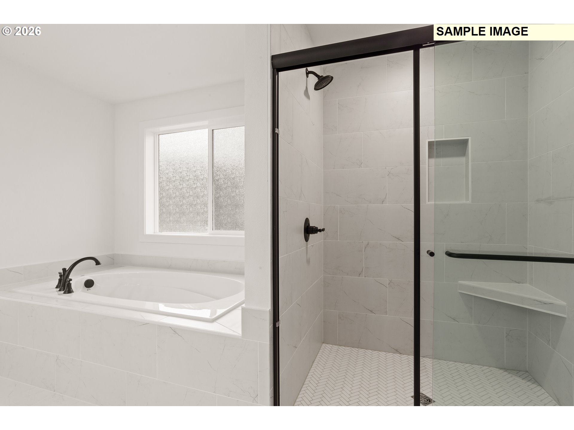 7283 Southwest Frog Pond Lane Wilsonville, OR 97070 - Photo 27 of 33 a bathroom with a tub and a shower