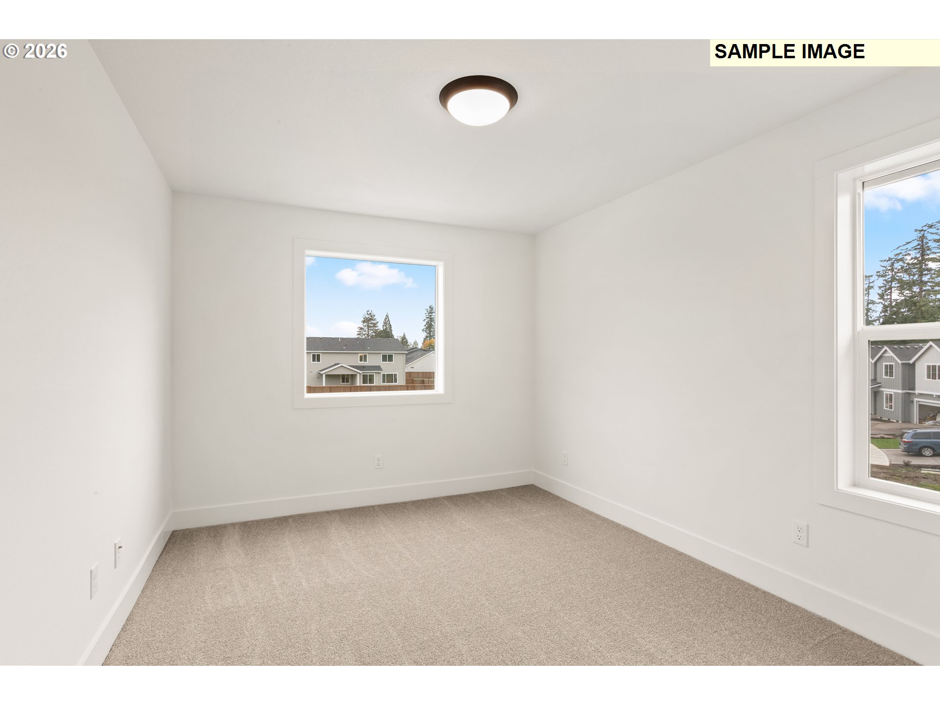 7283 Southwest Frog Pond Lane Wilsonville, OR 97070 - Photo 28 of 33 a view of an empty room with a window