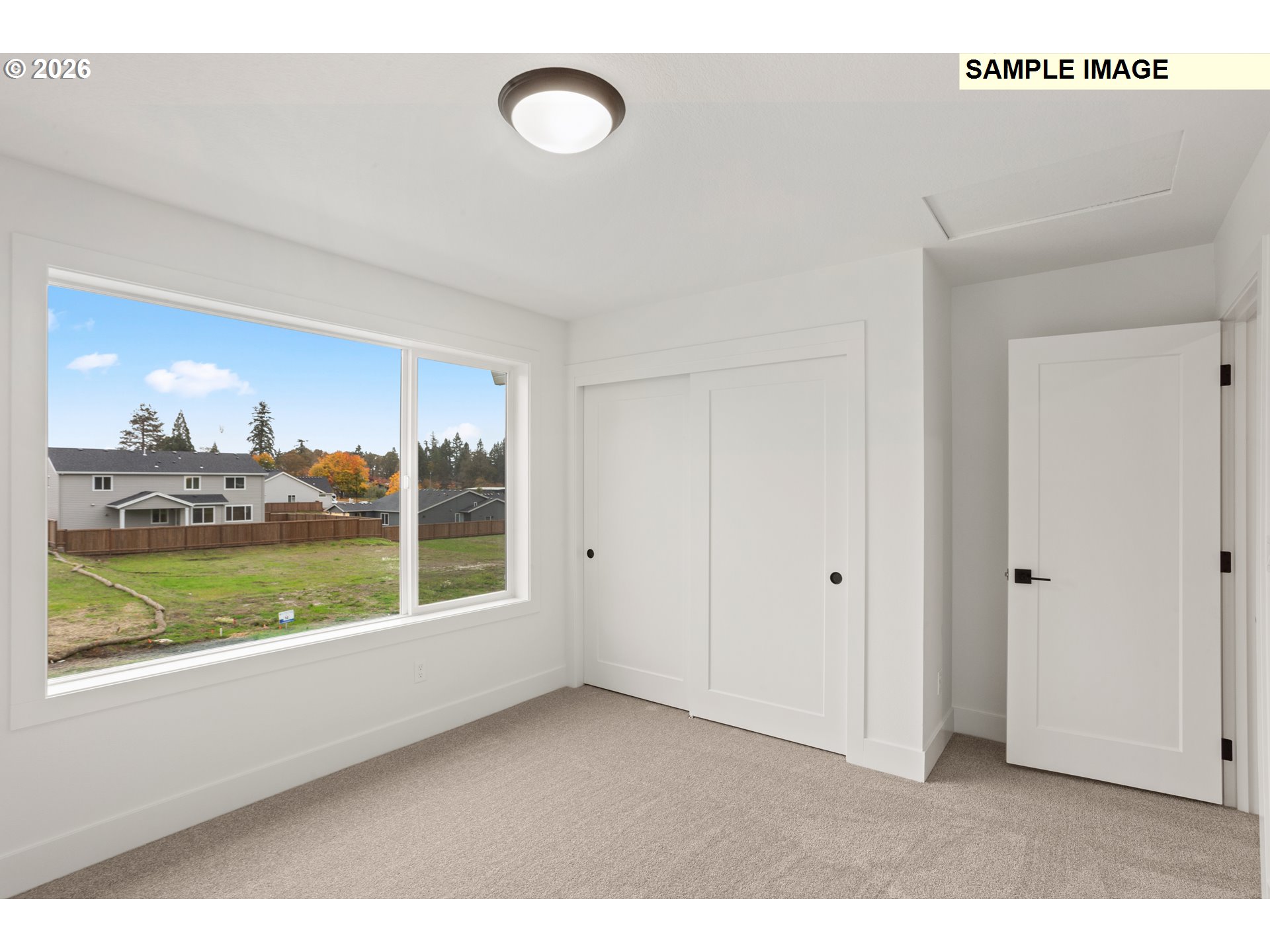 7283 Southwest Frog Pond Lane Wilsonville, OR 97070 - Photo 30 of 33 a view of an empty room with a window