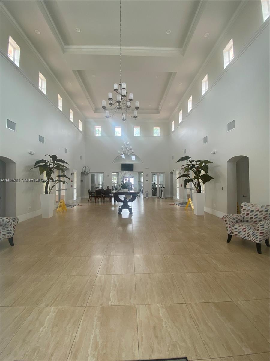 12812 Southwest 134th Terrace Miami, FL 33186 - Photo 39 of 41 a view of a room with gym equipment