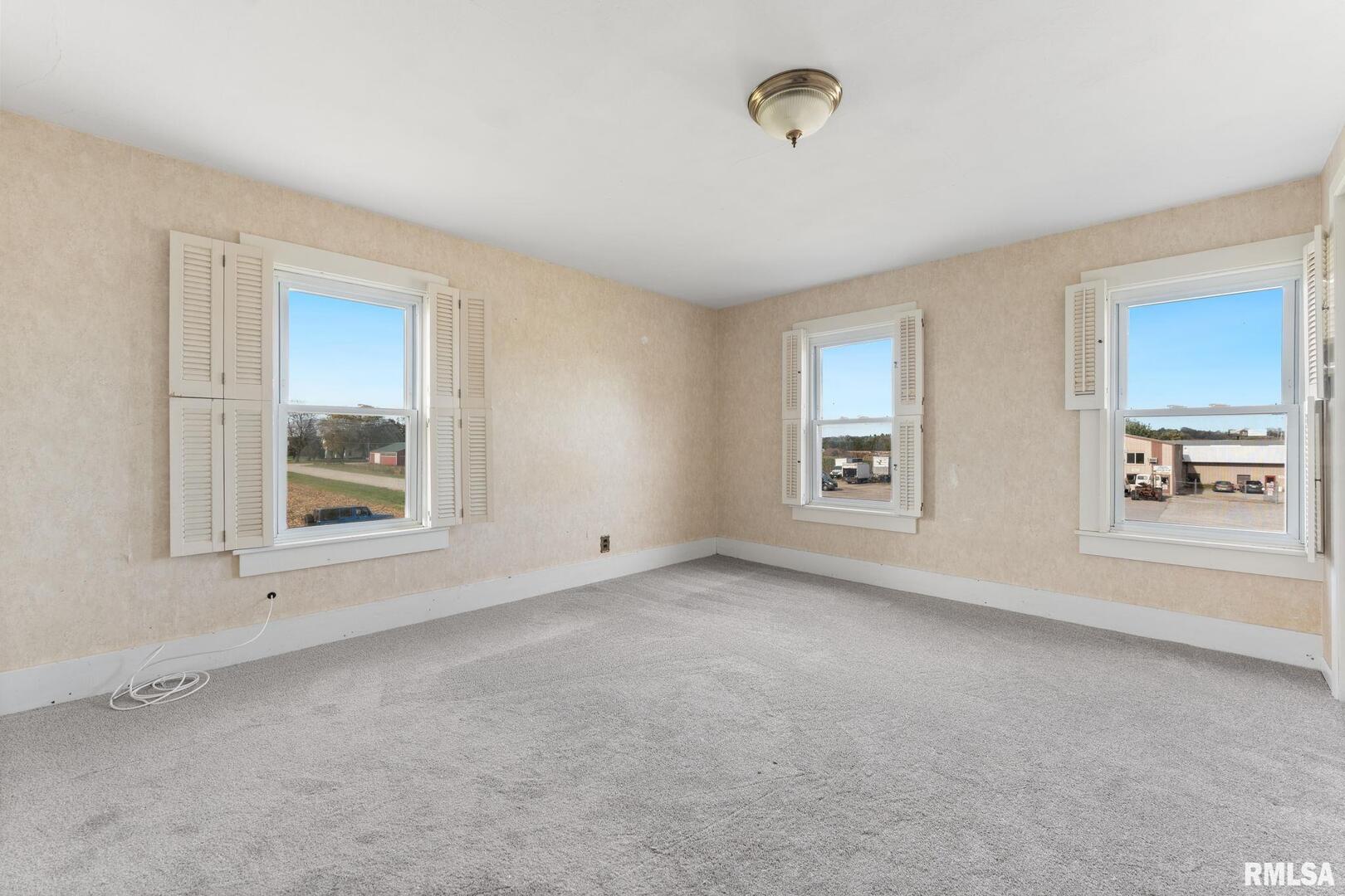 2442 Mittman Road Muscatine, IA 52761 - Photo 24 of 24 a view of an empty room with a window
