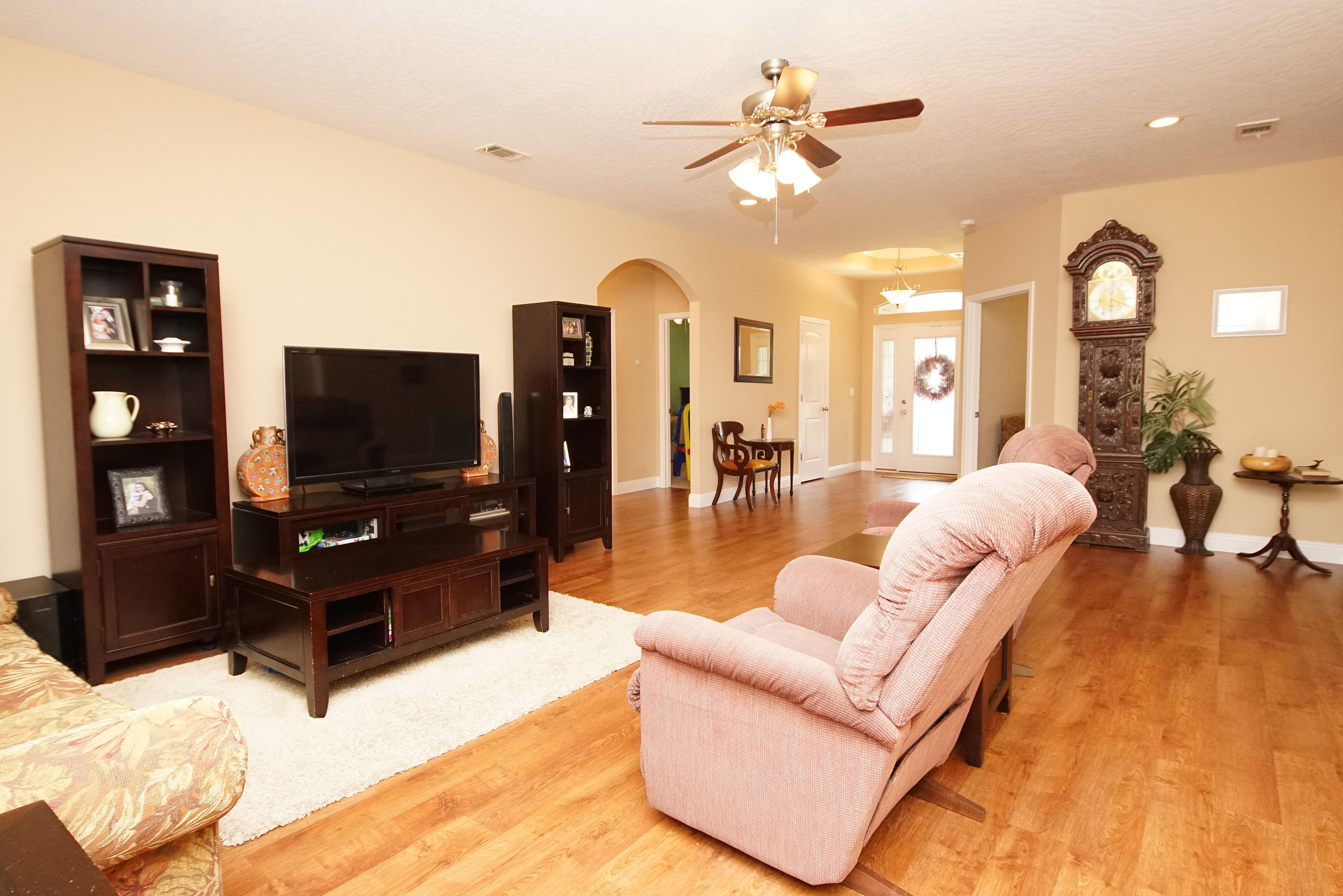 616 Lang Road Fort Walton Beach, FL 32547 - Photo 1 of 54 a living room with furniture and a flat screen tv