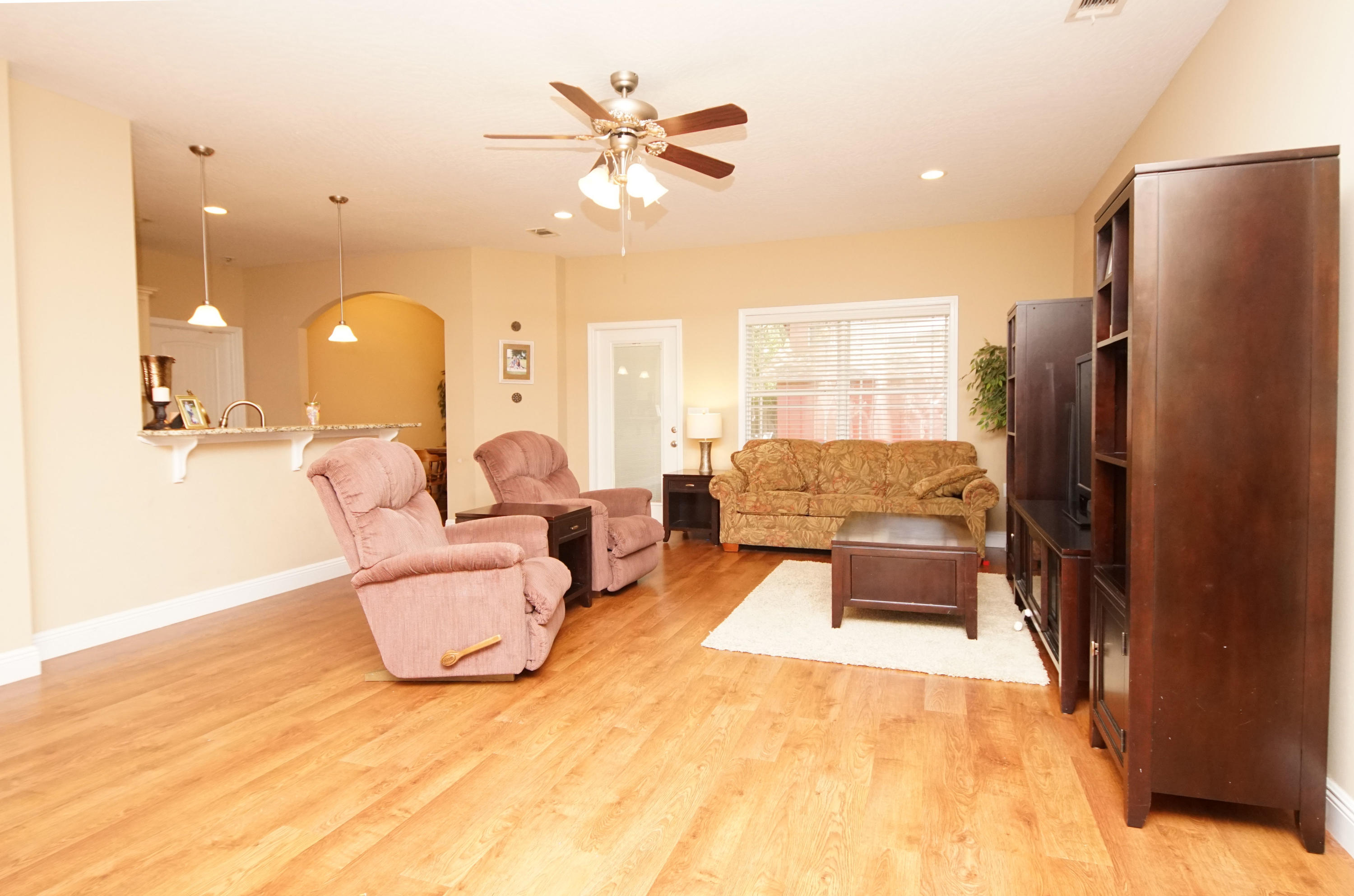 616 Lang Road Fort Walton Beach, FL 32547 - Photo 2 of 54 a living room with furniture and a large window