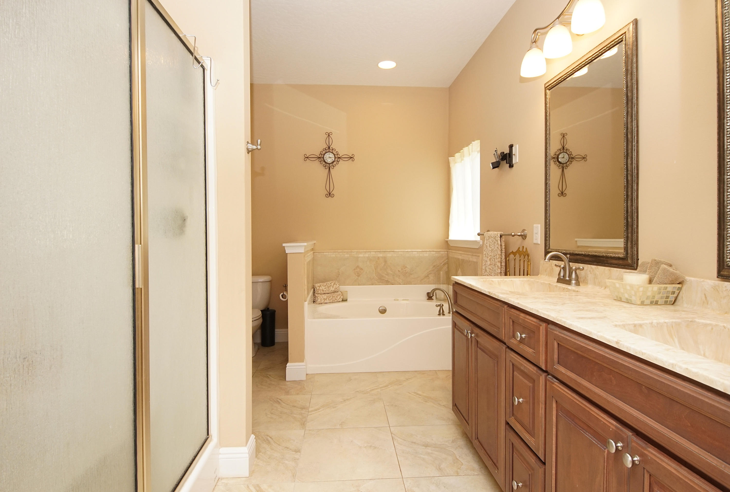 616 Lang Road Fort Walton Beach, FL 32547 - Photo 25 of 54 a spacious bathroom with a granite countertop sink mirror and a