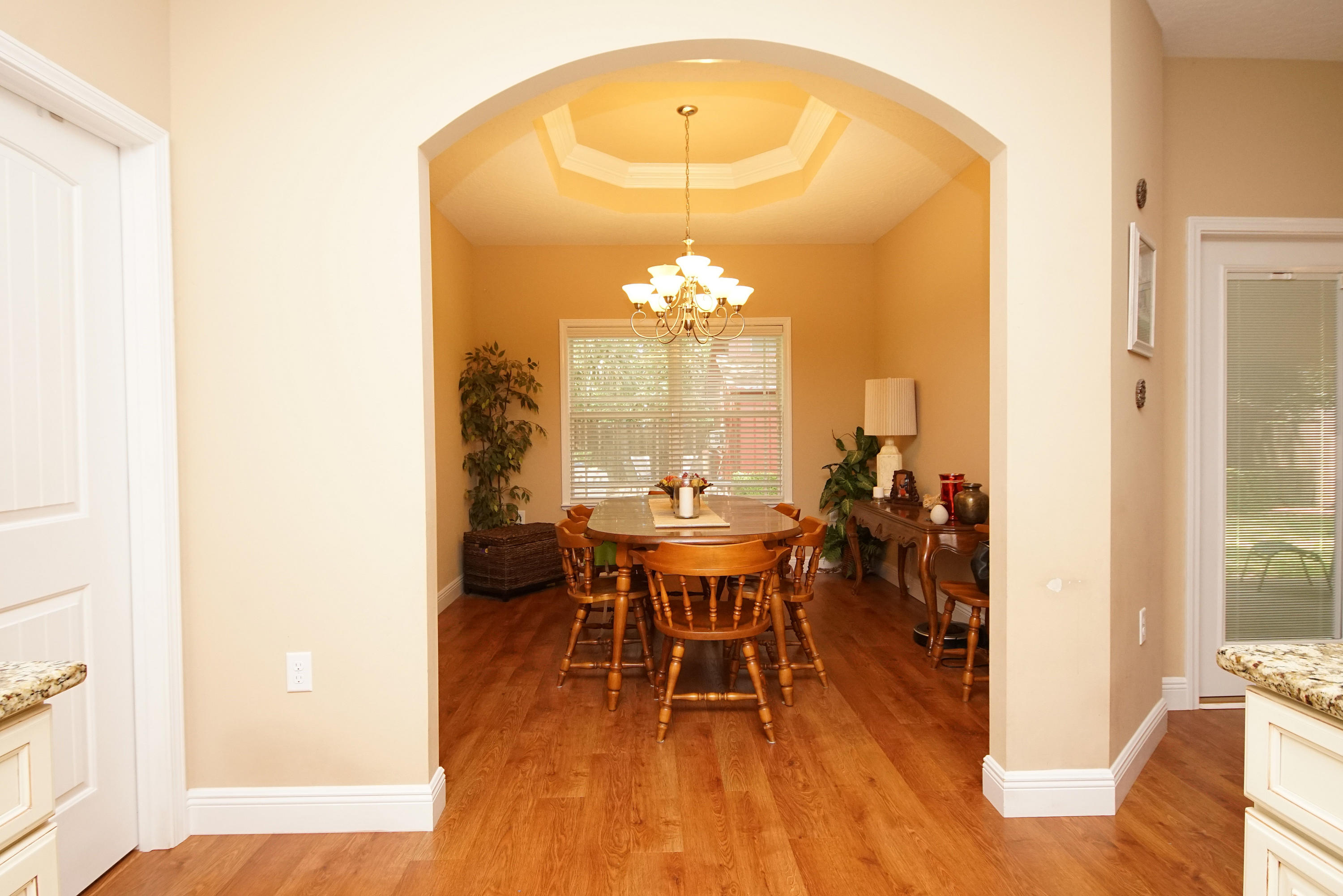 616 Lang Road Fort Walton Beach, FL 32547 - Photo 32 of 54 a view of a dining room with furniture and wooden floor
