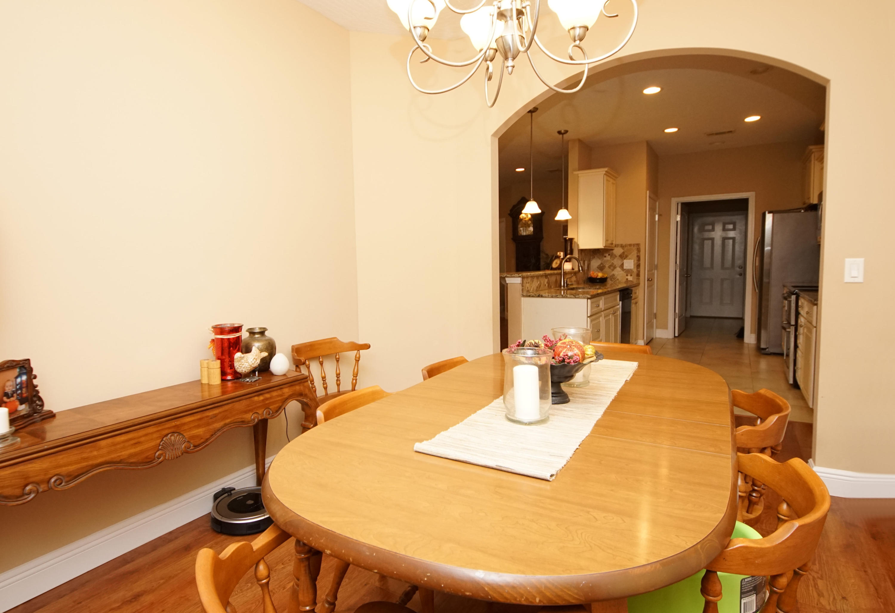 616 Lang Road Fort Walton Beach, FL 32547 - Photo 33 of 54 a view of a dining room with furniture and wooden floor