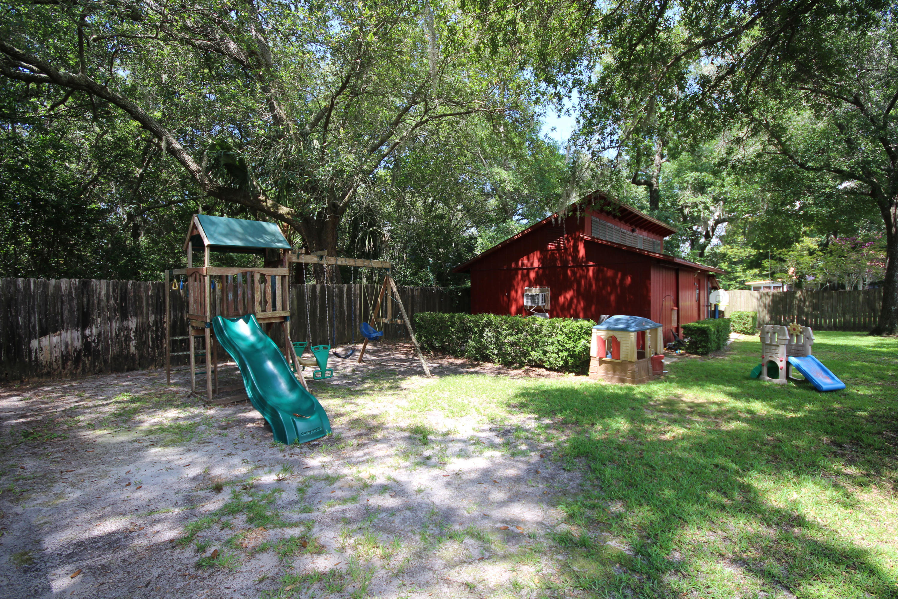 616 Lang Road Fort Walton Beach, FL 32547 - Photo 48 of 54 a view of a house with backyard and sitting area