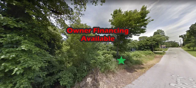 a sign that is on a sidewalk