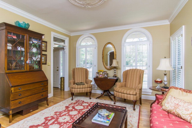 54 Cedar Ridge Court Macon, GA 31210 - Photo 3 of 24 a living room with furniture a rug potted plant and a large window