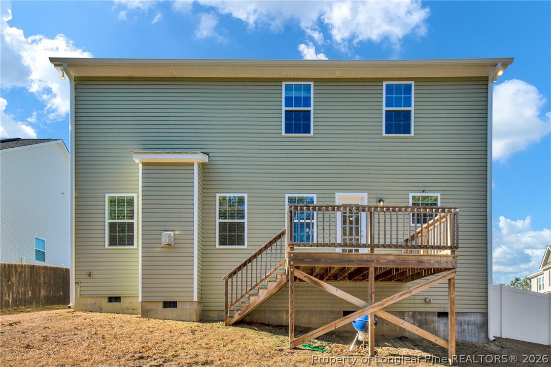 448 Pittfield Run Cameron, NC 28326 - Photo 38 of 43 a view of a house with wooden deck