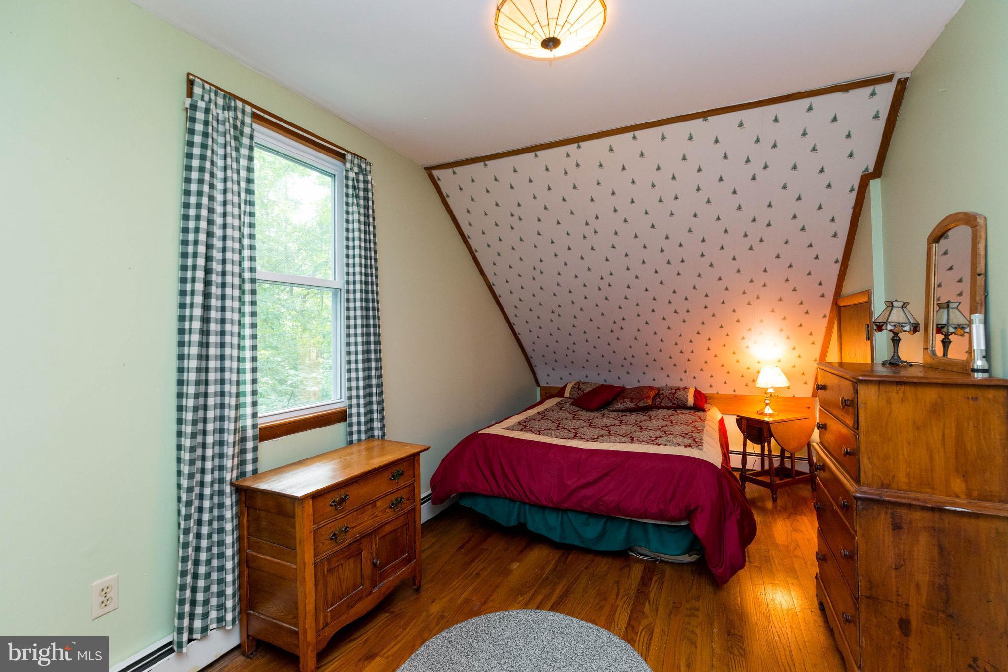 2704 Carrollton Road Finksburg, MD 21048 - Photo 20 of 30 Bedroom 2 has a hardwood floor.