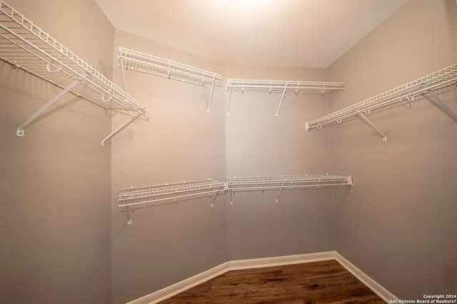 a view of a room with racks on the wall
