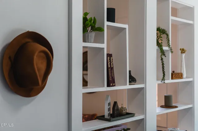 a view of a hallway with washer and dryer
