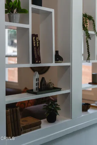 a close view of shoes and cabinets in a room