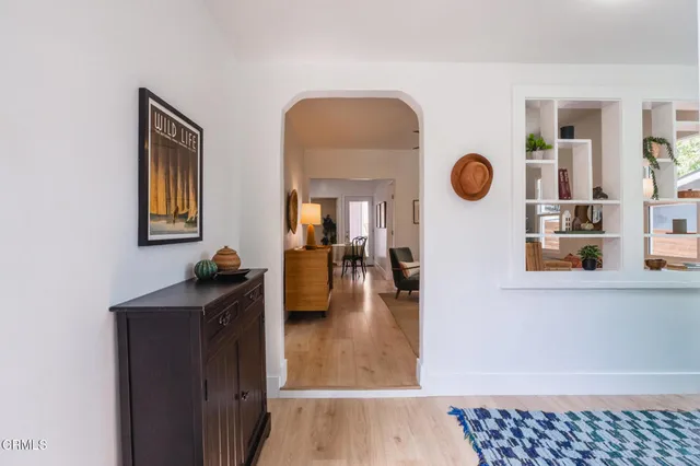 a view of dining room and wooden floor