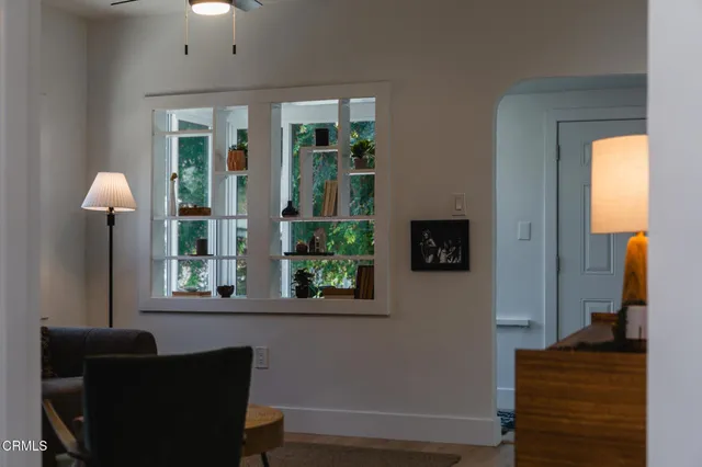 a view of a living room and a window