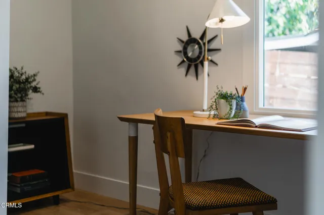 a view of entryway with a potted plant on a sink