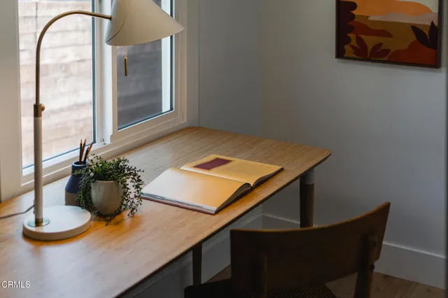 a view of a dining room with furniture