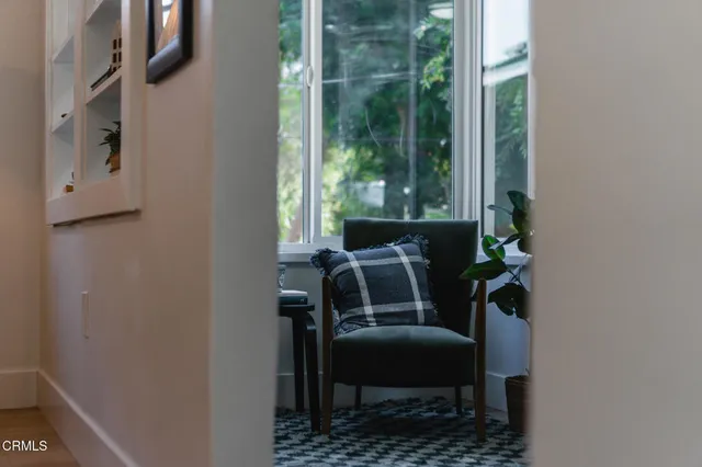 a view of balcony with furniture