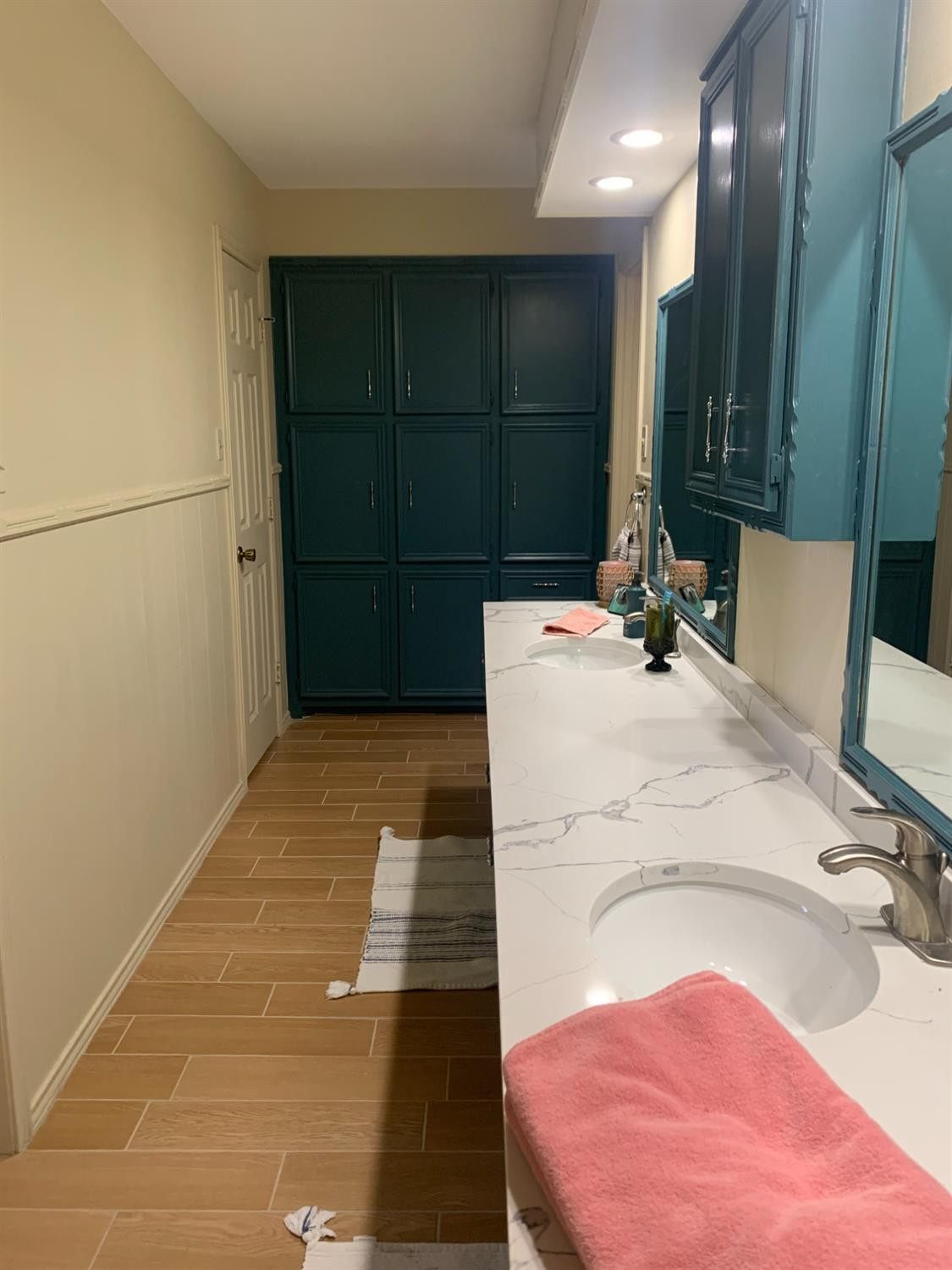 5726 70th Street Lubbock, TX 79424 - Photo 16 of 24 a bathroom with a tub sink and mirror