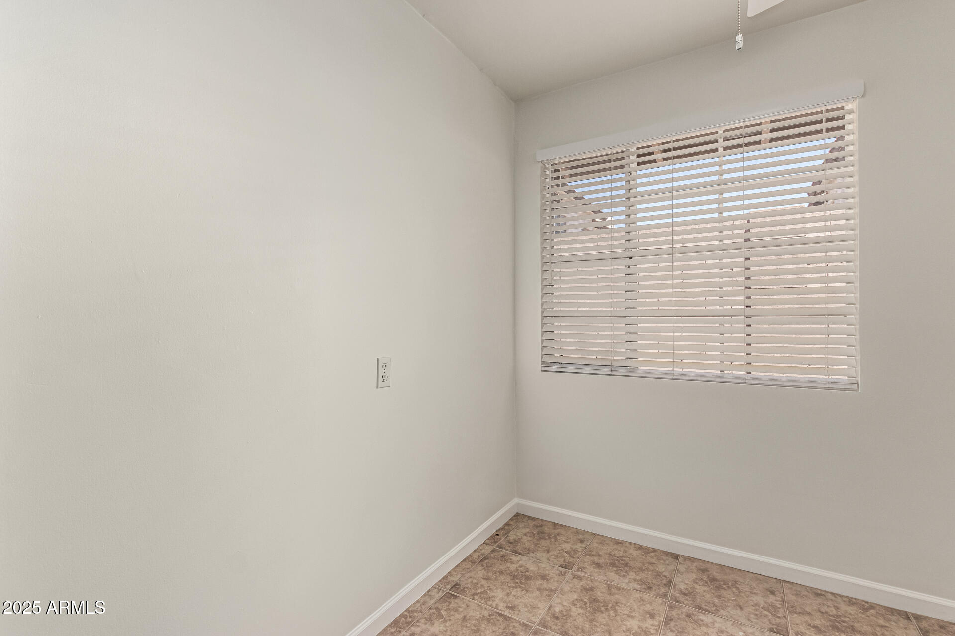 3540 East Montecito Avenue, Unit 3 Phoenix, AZ 85018 - Photo 13 of 23 a view of a small space with a window