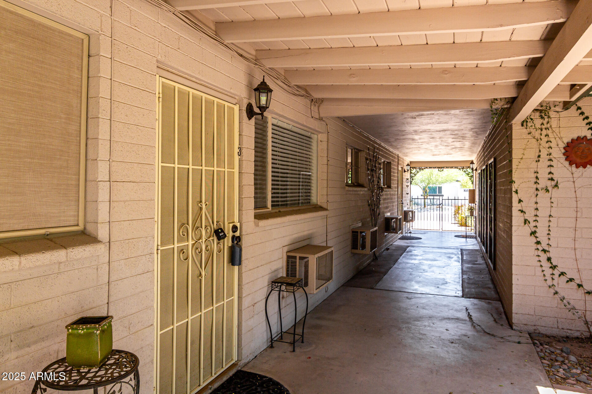 3540 East Montecito Avenue, Unit 3 Phoenix, AZ 85018 - Photo 5 of 23 a view of a porch