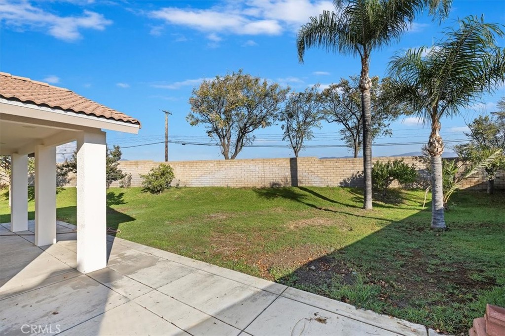 908 West Mesa Drive Rialto, CA 92376 - Photo 11 of 20 a view of a house with palm trees