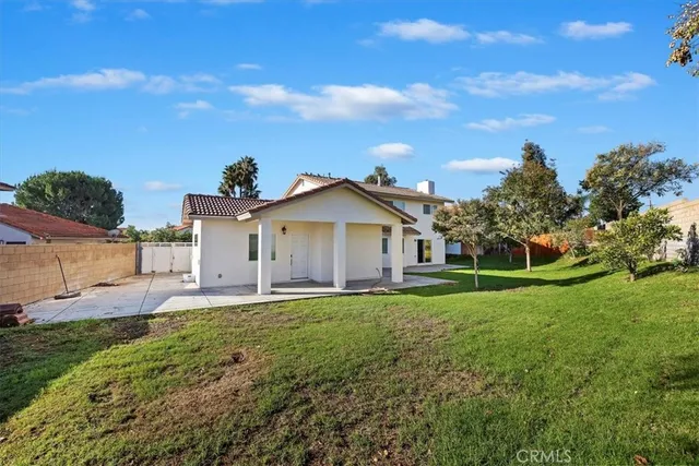 a house view with a garden space