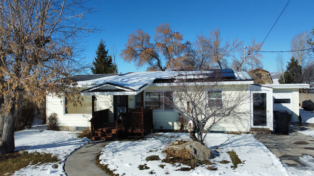 324 Stringtown Road Georgetown, ID 83239 - Photo 2 of 49 View of front of home with roof mounted solar panels