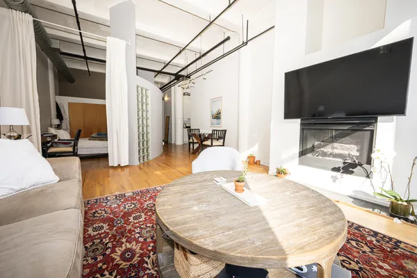 a view of a living room with furniture
