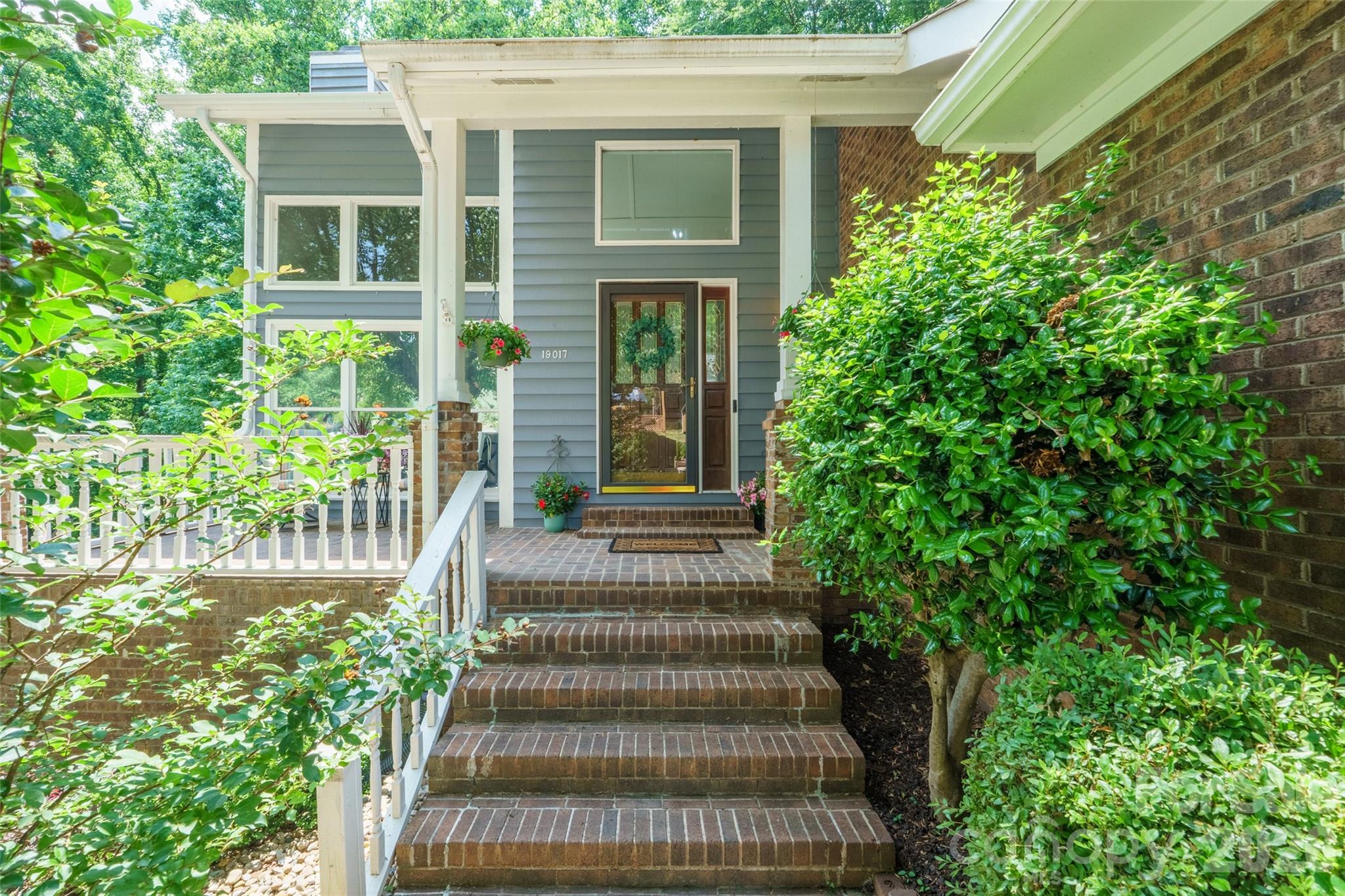 19017 Kailua Circle Tega Cay, SC 29708 - Photo 42 of 46 a front view of a house with a garden