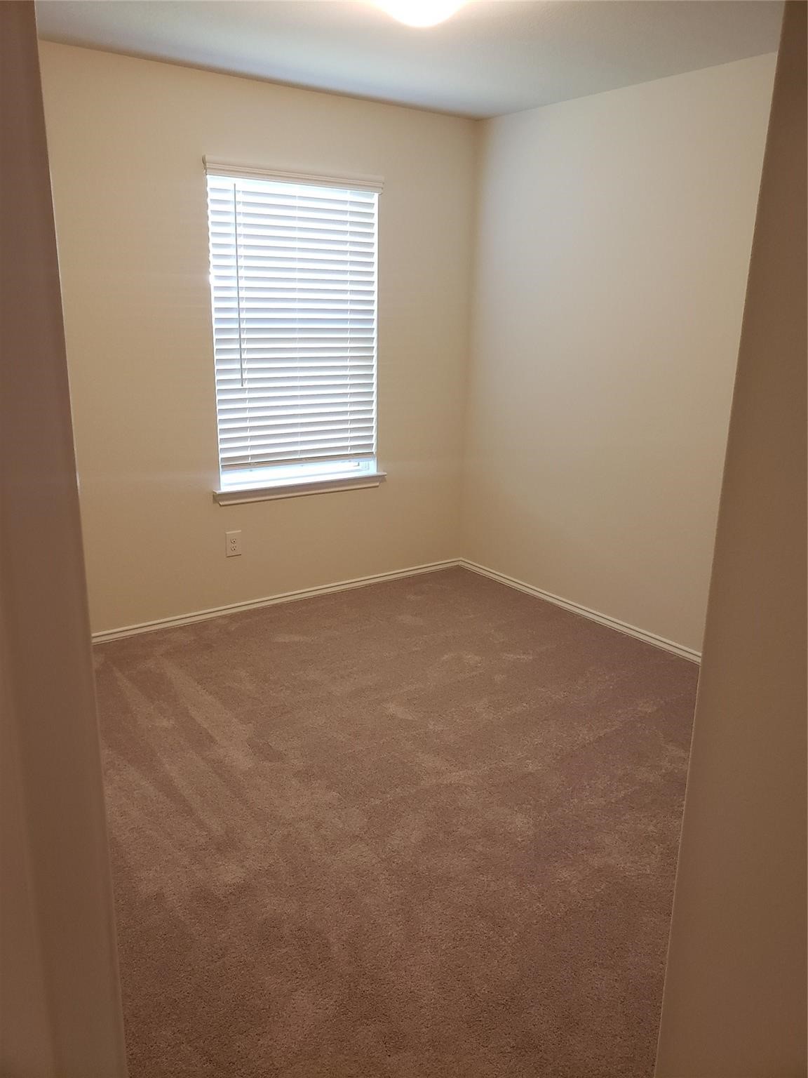 24006 Swather Way Hockley, TX 77447 - Photo 16 of 20 an empty room with a window