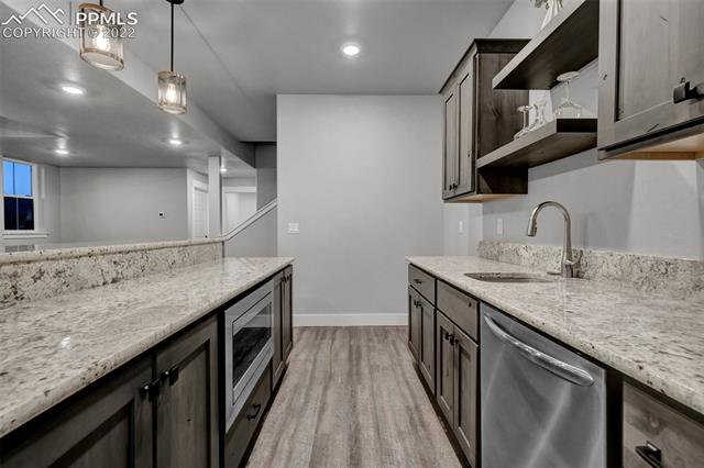 1954 Bashley Road Monument, CO 80132 - Photo 39 of 50 Wet Bar Dishwasher and Micro included