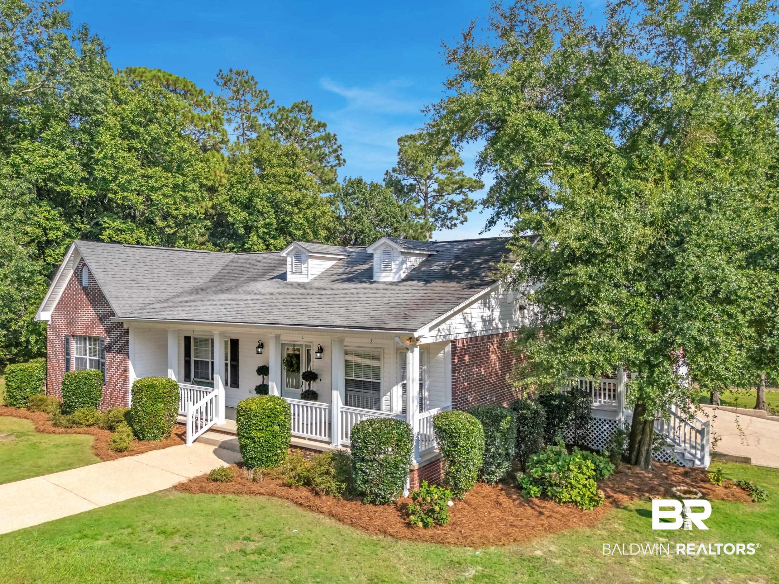 2 Navy Lane Daphne, AL 36527 - Photo 3 of 28 View of front of property with roof with shingles, a front yard, a porch, and brick siding