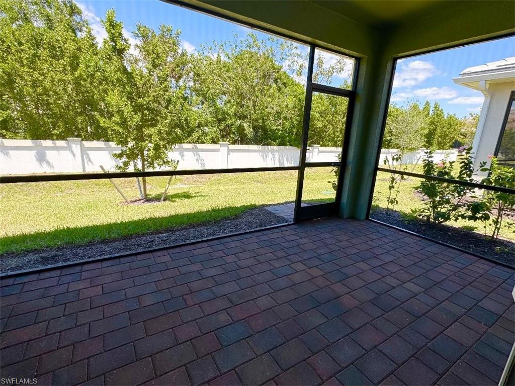 926 Enbrook Loop Naples, FL 34114 - Photo 23 of 24 View of unfurnished sunroom