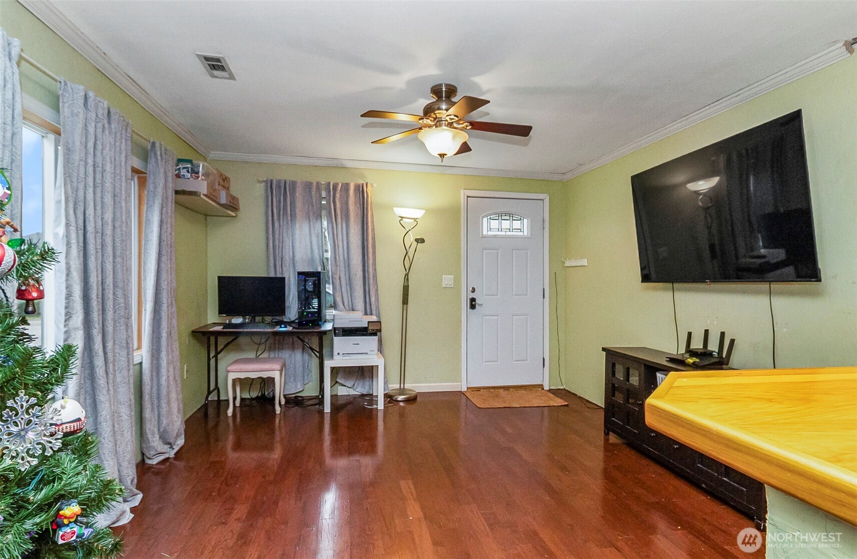 335 North Madison Street Monroe, WA 98272 - Photo 16 of 38 a living room with furniture and a flat screen tv